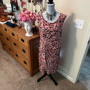 Woman’s Dress just below knee length , lovely colors of peach and cream etc